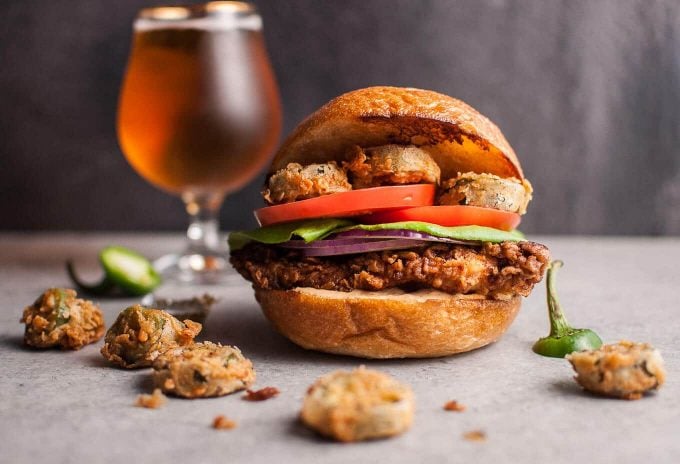 spicy fried chicken sandwich with fried jalapenos and tender buttermilk fried chicken