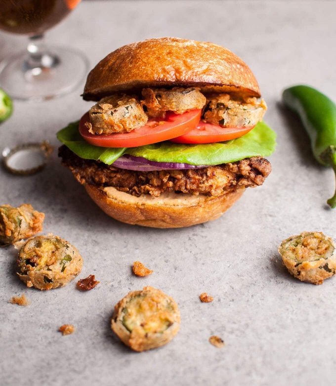 southwest fried chicken sandwich with fried jalapenos and a chipotle cilantro lime ranch sauce