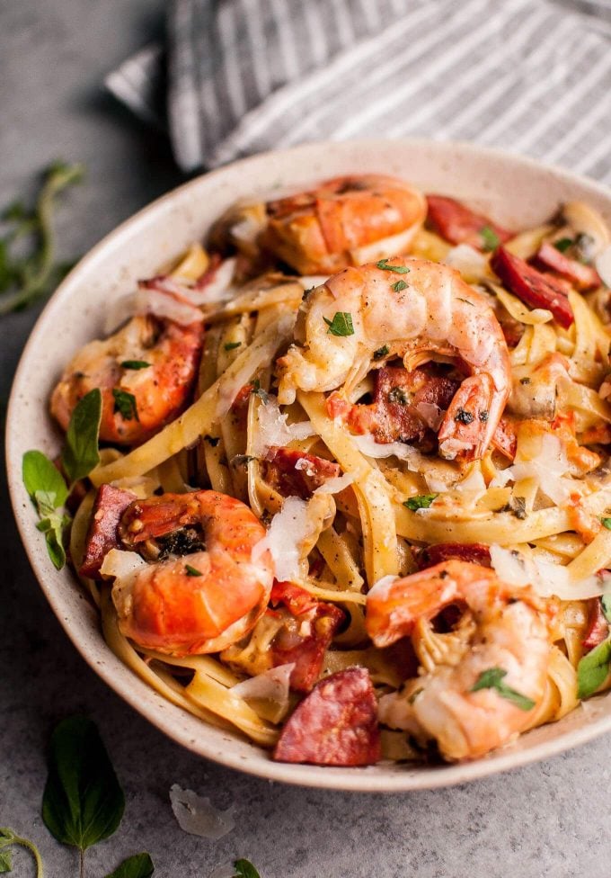 close-up of simple shrimp and chorizo pasta with mushrooms in a bowl