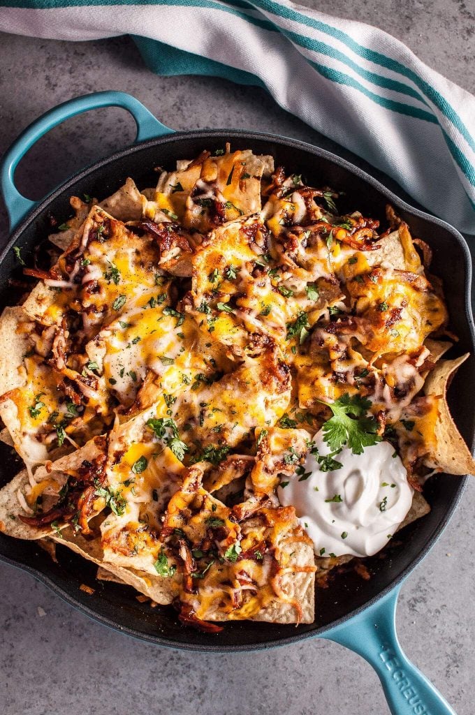 barbecue chicken skillet nachos with sour cream