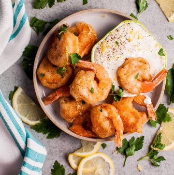 These crispy beer battered fried shrimp make an awesome appetizer! The dipping sauce is fresh and zesty.