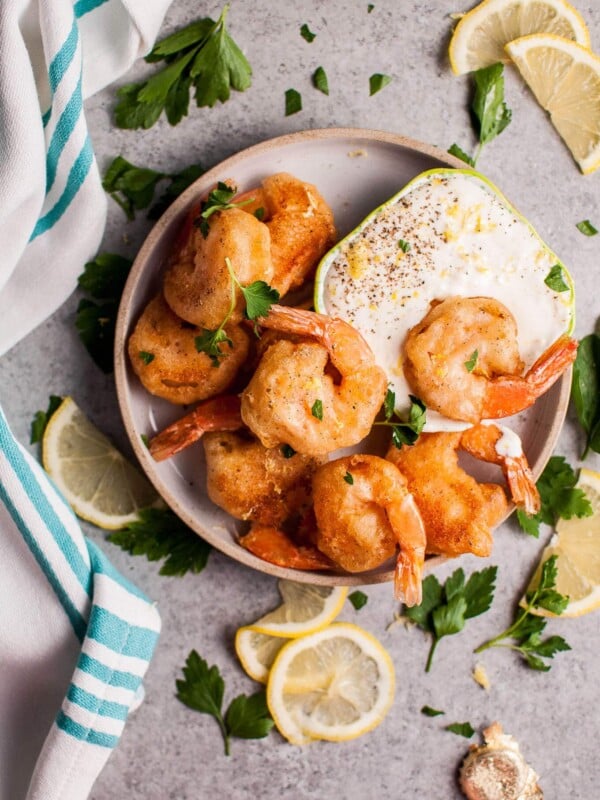 These crispy beer battered fried shrimp make an awesome appetizer! The dipping sauce is fresh and zesty.