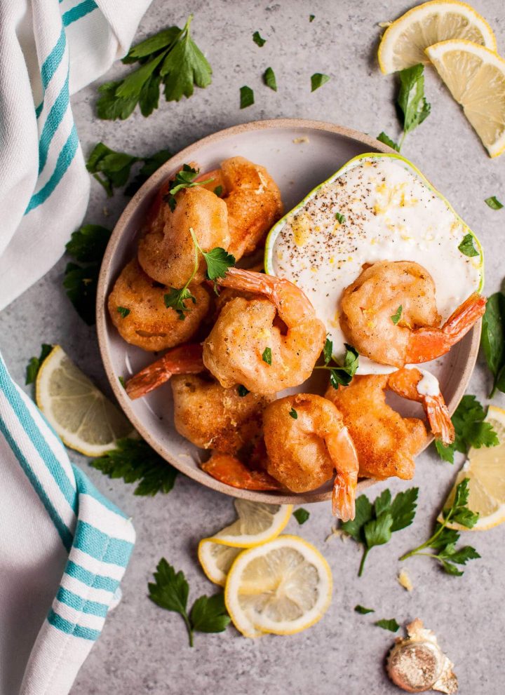 These crispy beer battered fried shrimp make an awesome appetizer! The dipping sauce is fresh and zesty.