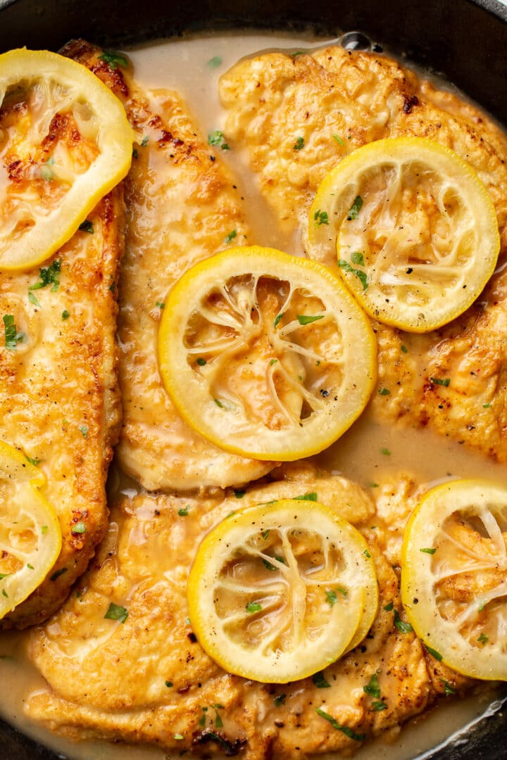 closeup of chicken francese in a skillet