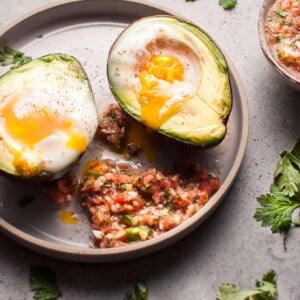 These baked huevos rancheros avocados are an easy, fresh, and light vegetarian low carb breakfast or snack idea.