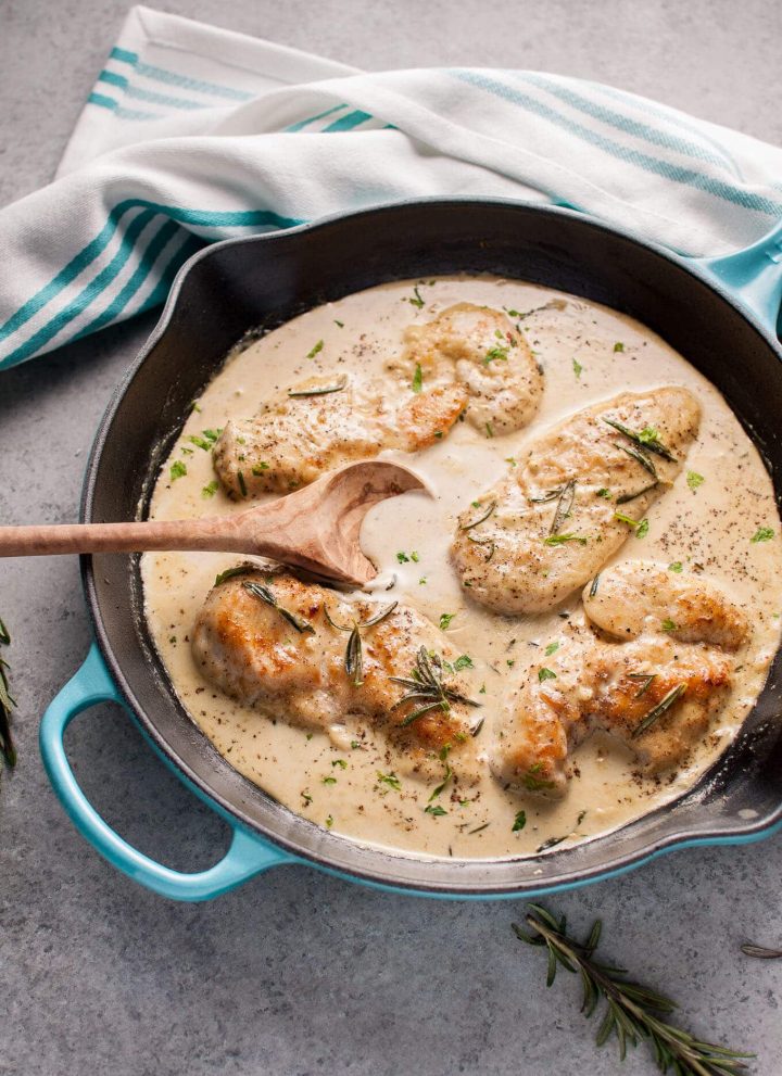 Tender chicken breast in a creamy Dijon rosemary sauce = an easy to make fall comfort food dinner you'll devour.