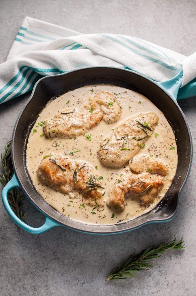 creamy Dijon chicken with rosemary in a skillet