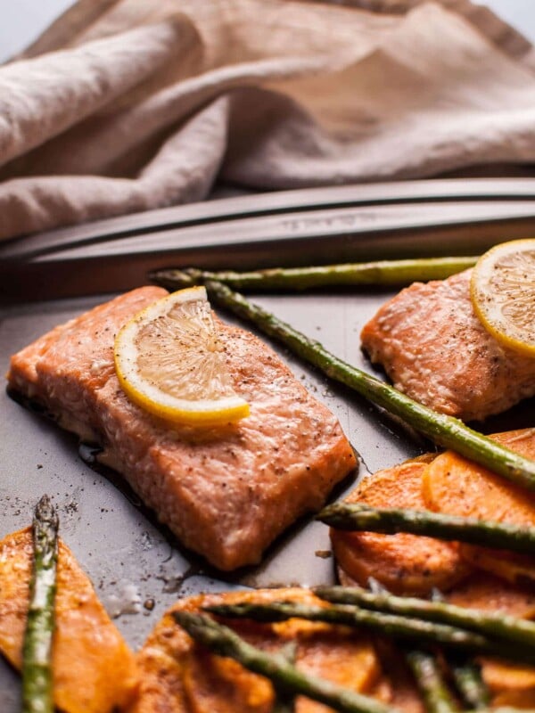 My maple salmon sheet pan dinner with sweet potatoes and asparagus is an easy, fast, delicious, and comforting fall meal!