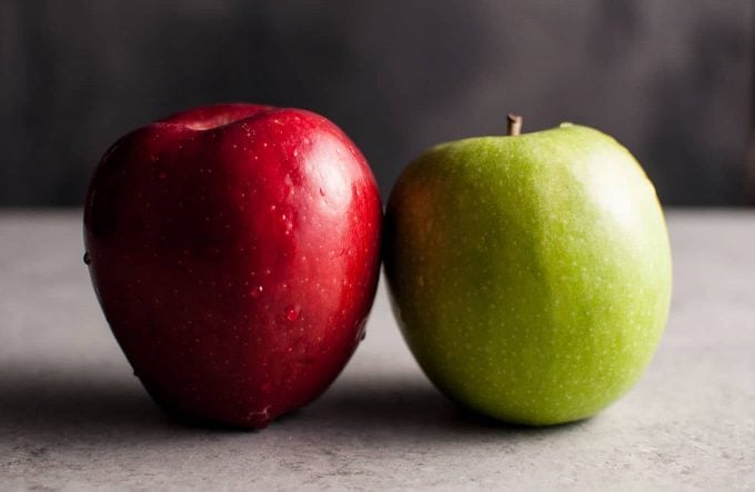 a green apple and a red apple