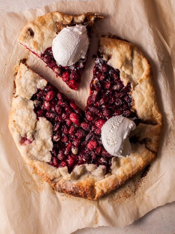 My rustic cranberry galette is a festive fall/winter/holiday dessert that will look beautiful on your table and delight your guests' tummies.