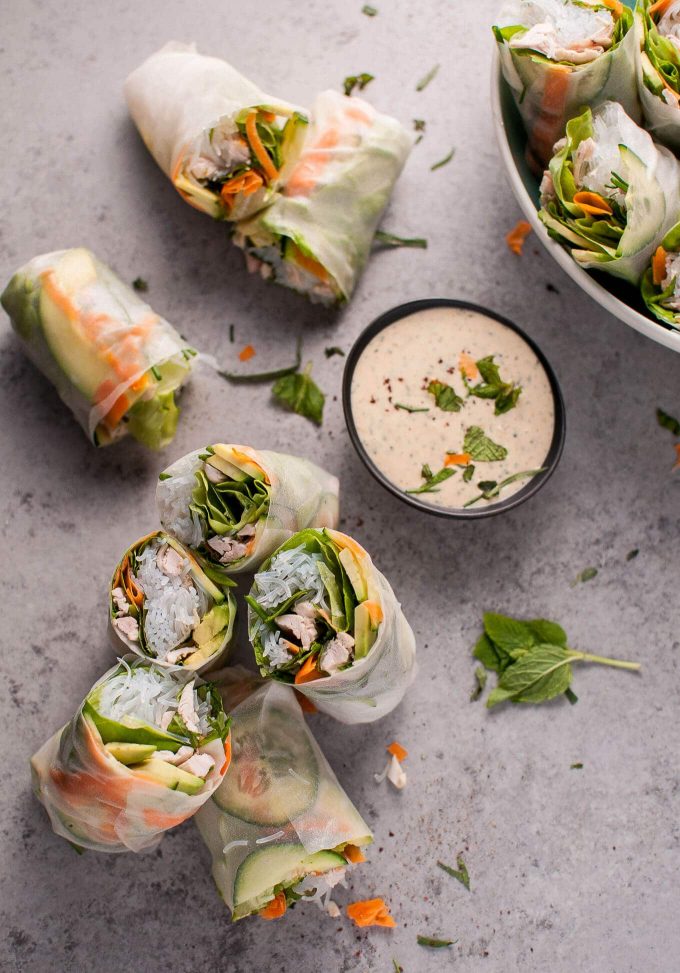 several leftover chicken salad rolls with bowl of miso tarragon dipping sauce