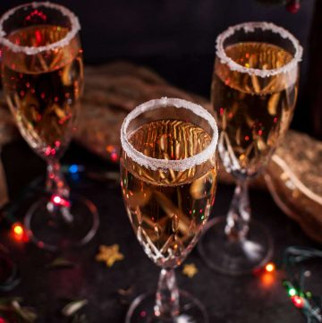 This Christmas pear champagne cocktail is simple, different, and luxe! The perfect cocktail for the holidays or to ring in the New Year. Poire Williams is added to champagne or sparkling wine to create this delicious drink.
