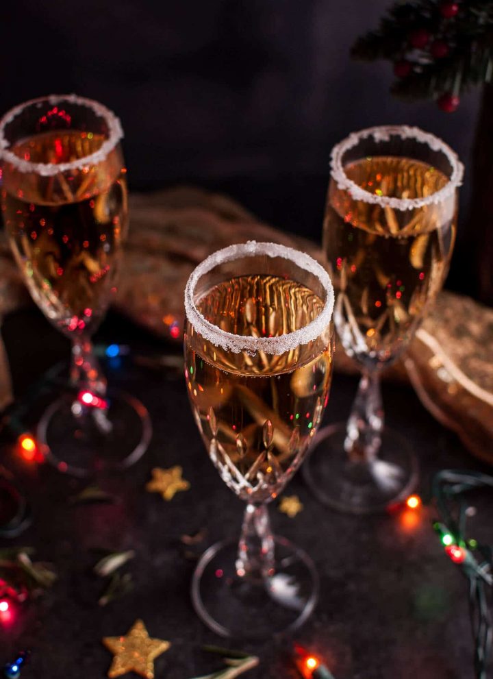 This Christmas pear champagne cocktail is simple, different, and luxe! The perfect cocktail for the holidays or to ring in the New Year. Poire Williams is added to champagne or sparkling wine to create this delicious drink.