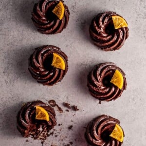 These mini chocolate bundt cakes with candied orange slices are packed full of chocolatey goodness and topped off with a festive touch.