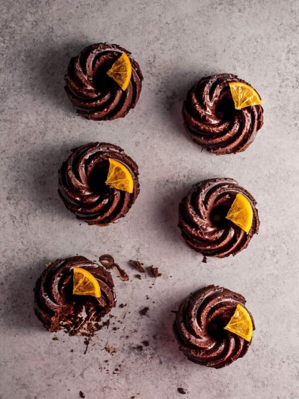 These mini chocolate bundt cakes with candied orange slices are packed full of chocolatey goodness and topped off with a festive touch.