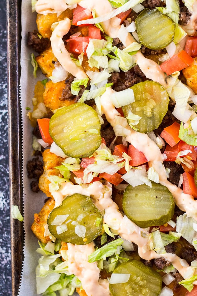 big mac tater tot nachos on a sheet pan