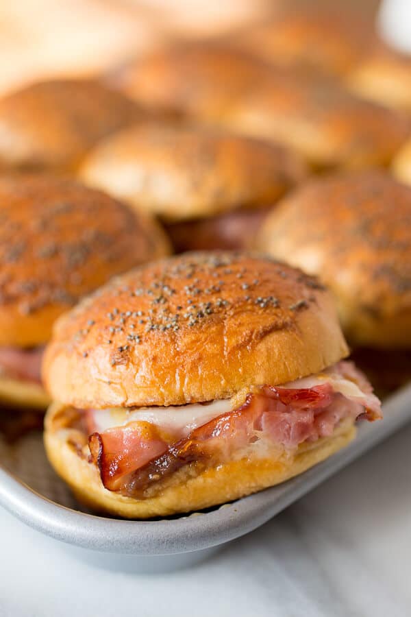 close-up of a ham and cheese sandwich in a bun