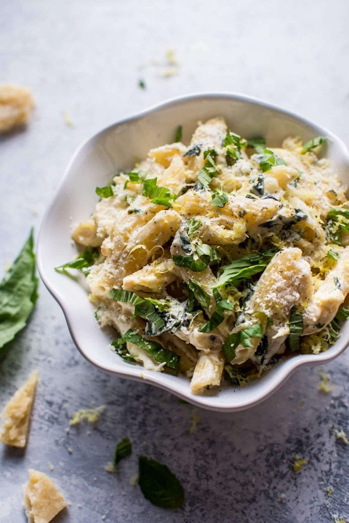 close-up of creamy lemon basil pasta in a bowl