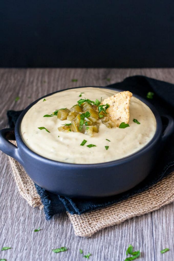 Mexican white cheese queso dip in a small ramekin