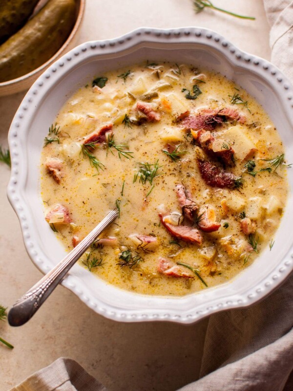Polish dill pickle soup with smoked ham is a hearty, savory, creamy, and comforting dish. A big pot of it can be on your table in only 45 minutes!