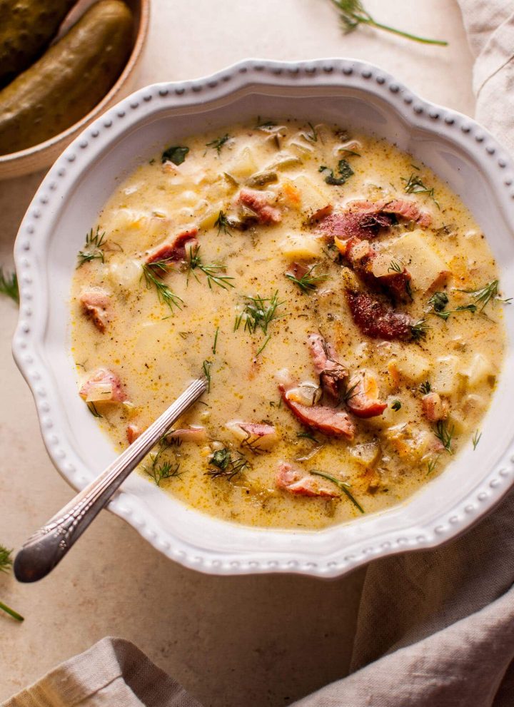 Polish dill pickle soup with smoked ham is a hearty, savory, creamy, and comforting dish. A big pot of it can be on your table in only 45 minutes!