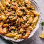 This quick and easy shrimp piccata recipe is ready in under half an hour. Succulent shrimp are cooked in a lemon-butter-caper sauce and served over penne.