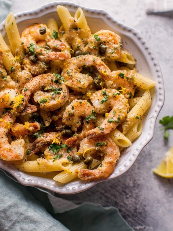 This quick and easy shrimp piccata recipe is ready in under half an hour. Succulent shrimp are cooked in a lemon-butter-caper sauce and served over penne.