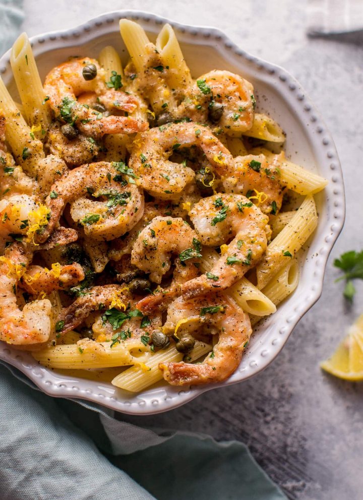 This quick and easy shrimp piccata recipe is ready in under half an hour. Succulent shrimp are cooked in a lemon-butter-caper sauce and served over penne.