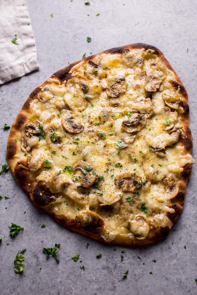 a whole vegetarian truffle mushroom naan bread homemade pizza