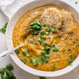 My roasted butternut squash and cauliflower soup with coconut milk is rich, silky, cozy, healthy, and full of flavor.