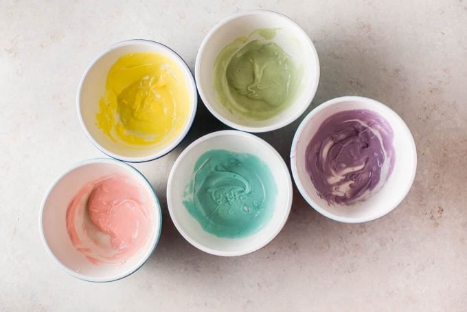 bowls of pastel-colored chocolate