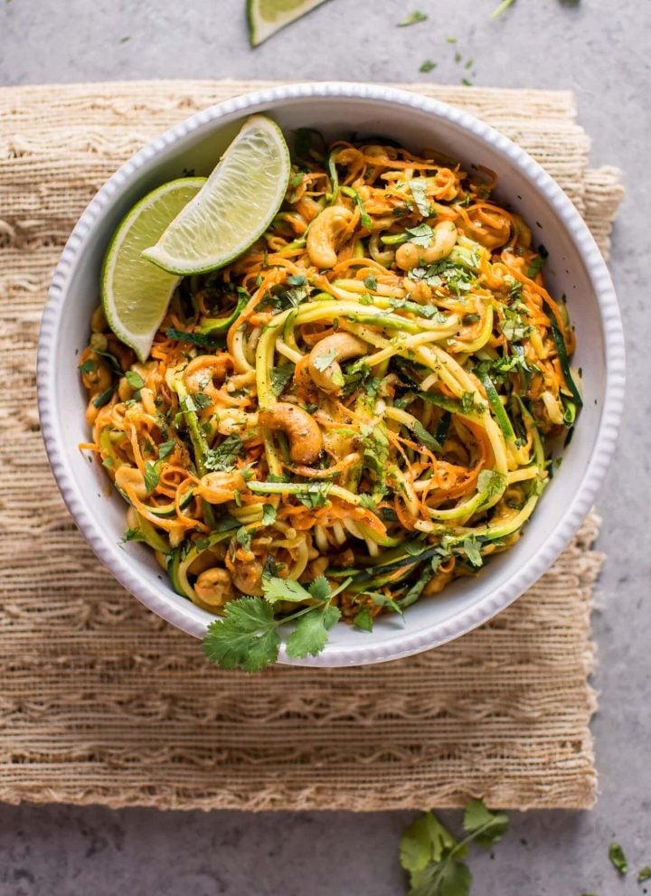 These 15 minute garlic lime cashew zoodles are a super easy and healthy vegan meal option. This is a snap to make, and the sauce is addictive!
