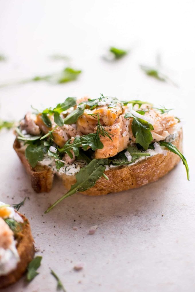 close-up of baked salmon tartine