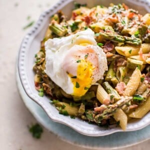 This asparagus and bacon pasta is fresh, lemony, a little bit creamy, and not too naughty! Perfect for spring.