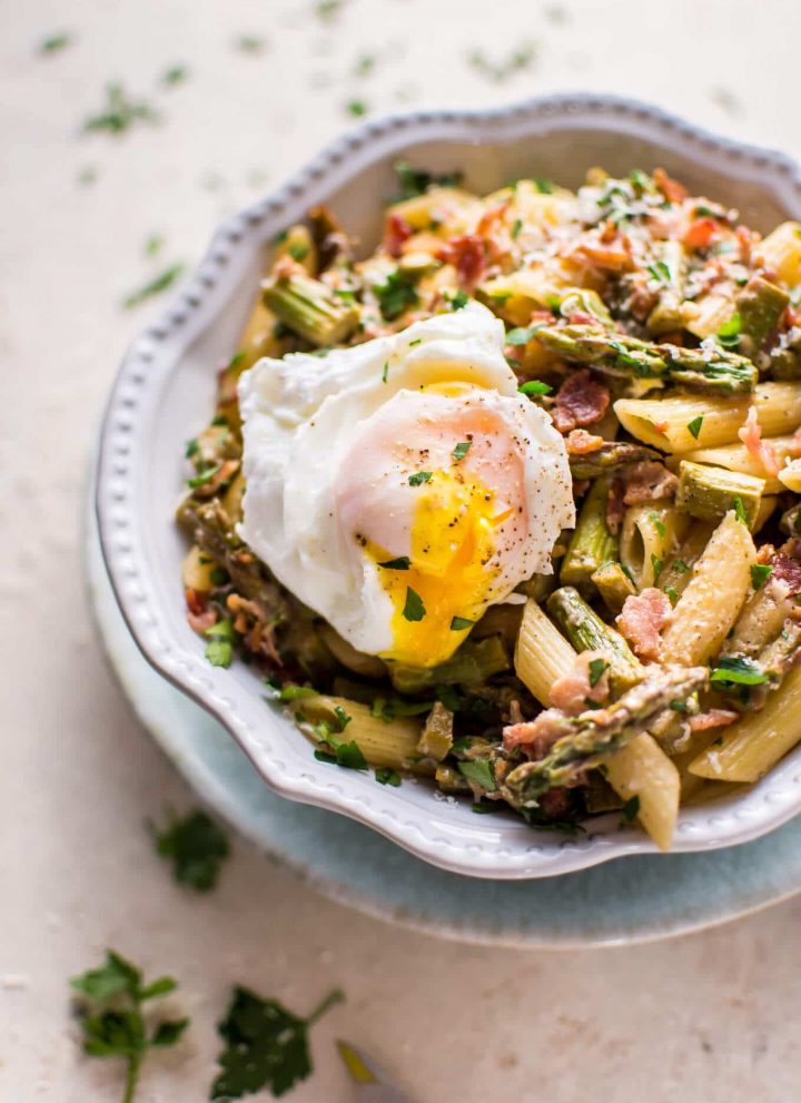 This asparagus and bacon pasta is fresh, lemony, a little bit creamy, and not too naughty! Perfect for spring.