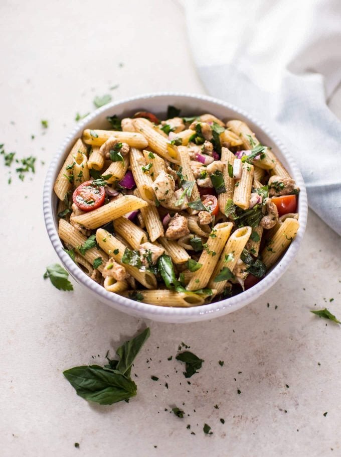 bowl of easy Caprese pasta salad in a bowl with penne