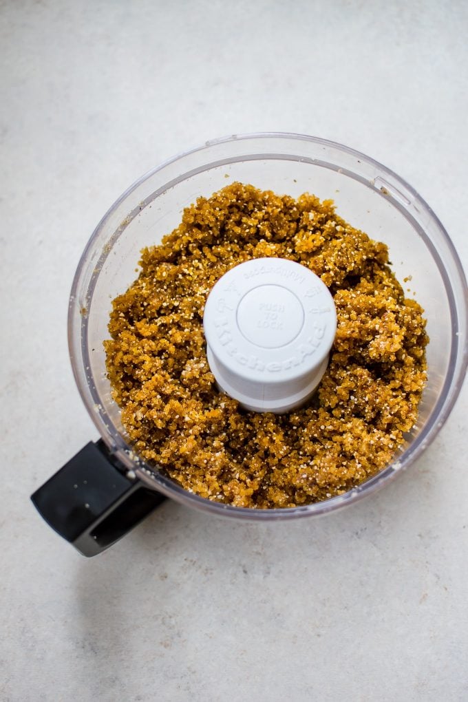 food processor with ingredients for easy apricot bliss balls