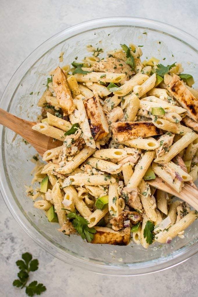 summer chicken pasta salad in a glass bowl