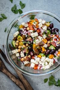 This Mediterranean chickpea salad has all the flavors of a classic Greek salad plus hearty chickpeas and fresh oregano and parsley for an extra pop of flavor. A wonderful light meal or side dish!