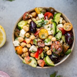 This Mediterranean chickpea salad has all the flavors of a classic Greek salad plus hearty chickpeas and fresh oregano and parsley for an extra pop of flavor. A wonderful light meal or side dish!