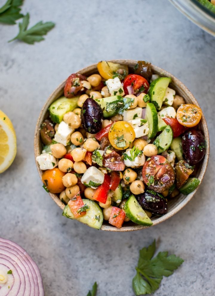 This Mediterranean chickpea salad has all the flavors of a classic Greek salad plus hearty chickpeas and fresh oregano and parsley for an extra pop of flavor. A wonderful light meal or side dish!