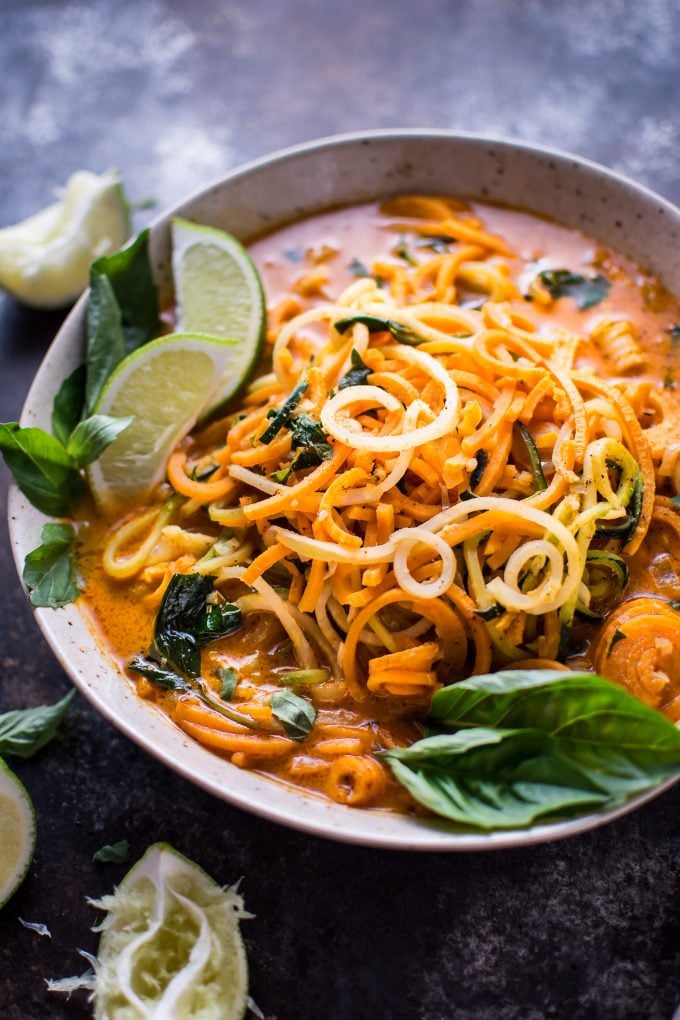 bowl of Thai coconut curry soup garnished with lime