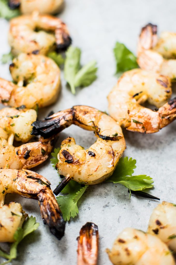 close-up of grilled tequila lime shrimp on a skewer
