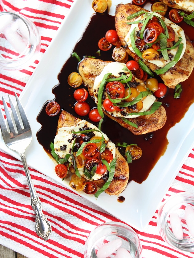 balsamic grilled chicken caprese on a plate with a fork