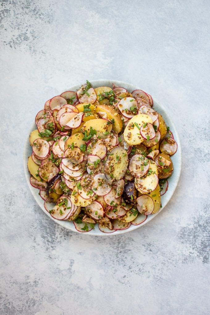 vegan grainy mustard potato salad in a bowl