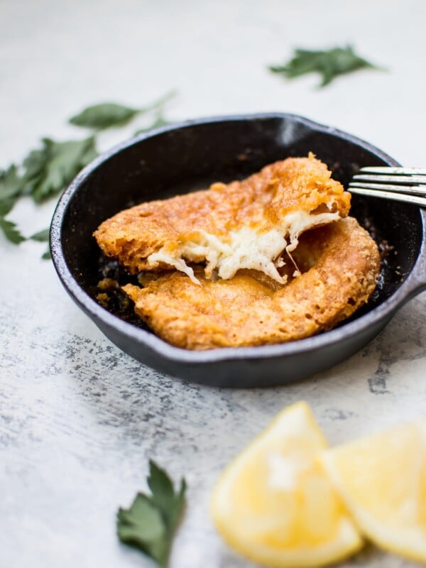 Saganaki (Greek fried cheese) is crunchy on the outside and melty on the inside. If you like cheese, you're going to love this appetizer. Ready in 10 minutes!