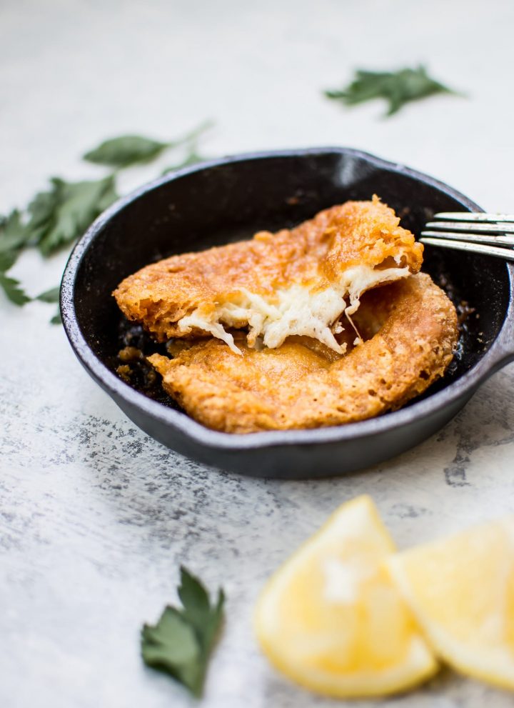 Saganaki (Greek fried cheese) is crunchy on the outside and melty on the inside. If you like cheese, you're going to love this appetizer. Ready in 10 minutes!