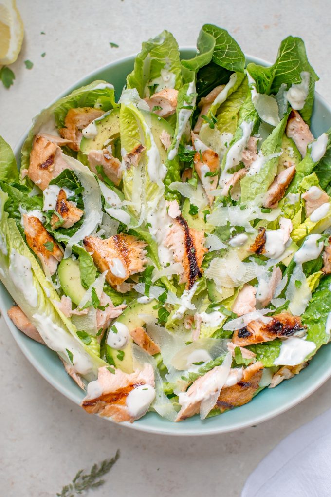 close-up of grilled salmon Caesar salad on a plate