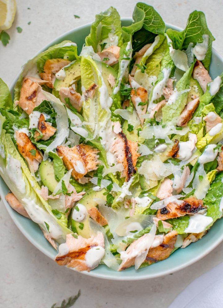 This healthier grilled salmon Caesar salad is lightened up so you can have that fabulous Caesar taste without all the extra calories.