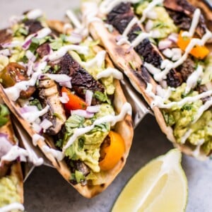 These vegetarian grilled portobello mushroom tacos are satisfying, healthy, TASTY, and make the perfect summer meal.